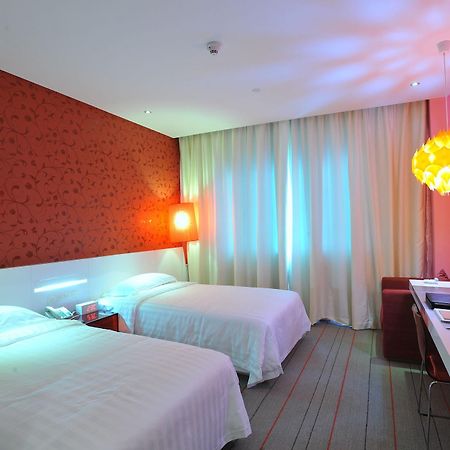 Otique Aqua Hotel Shenzhen Extérieur photo